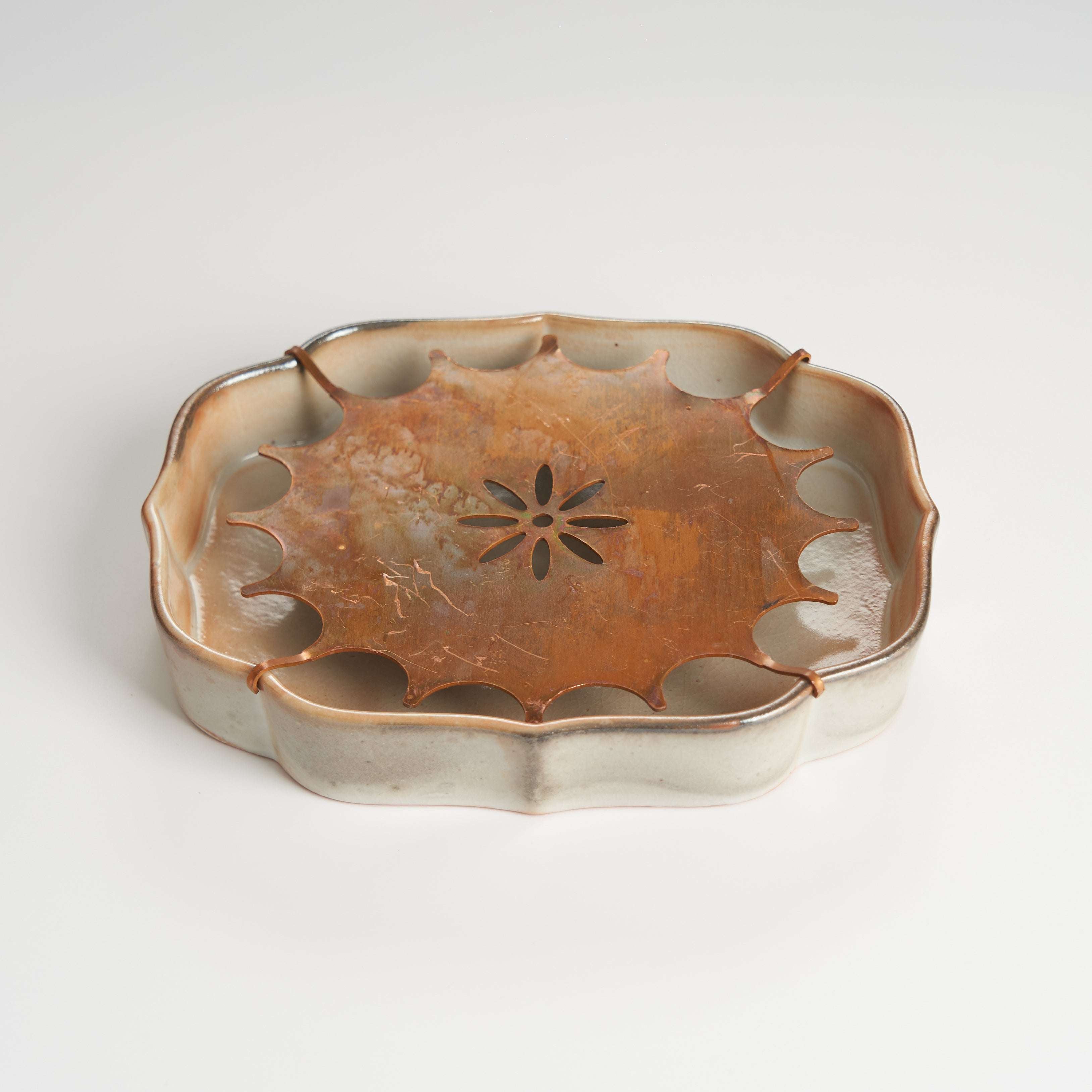 Rustic teapot holder with drain