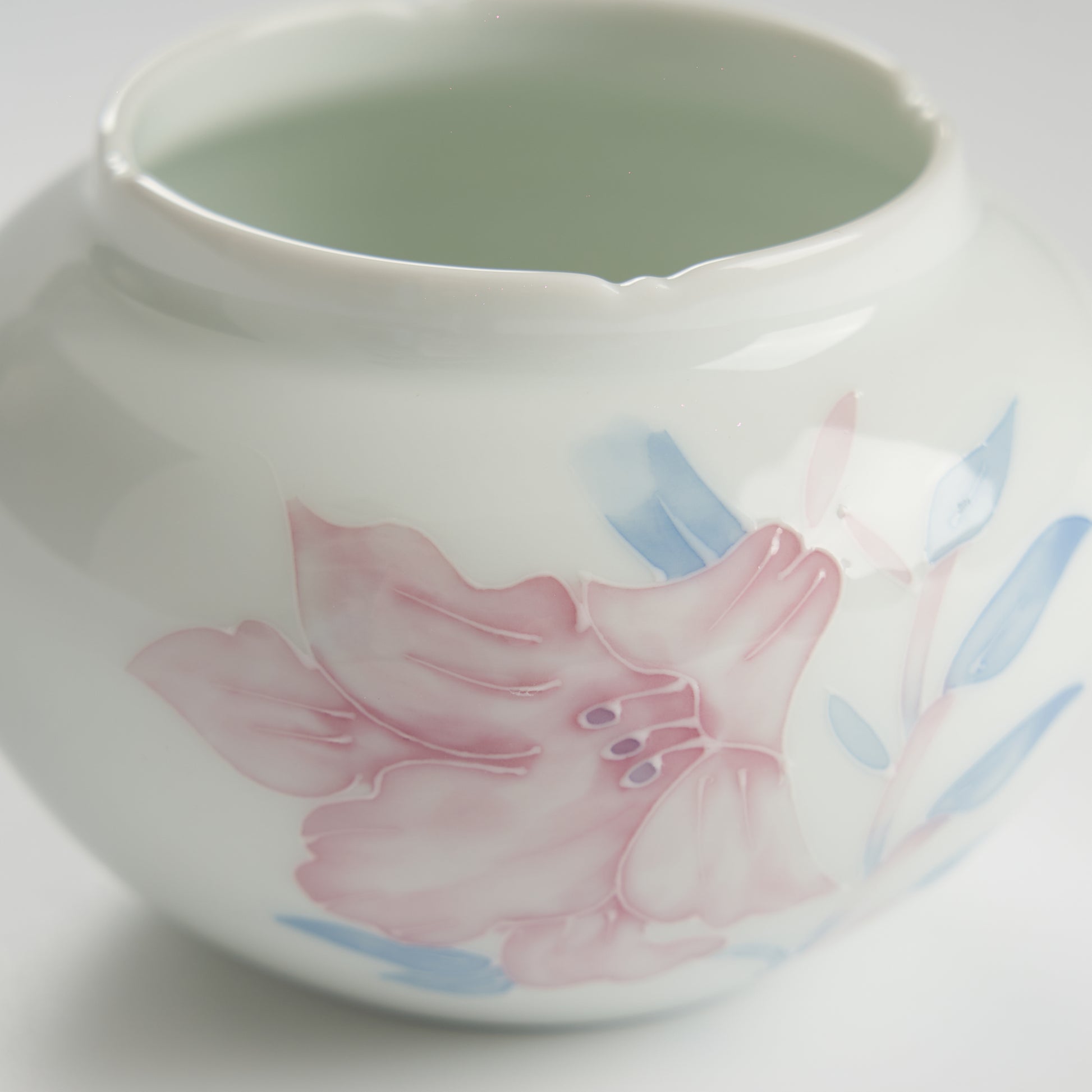 Close up pink lily on bowl