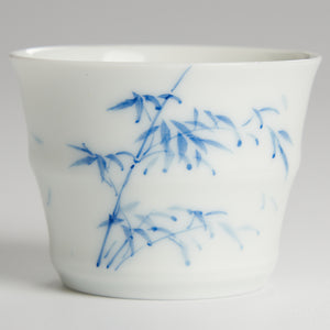 Small white porcelain tasting cup