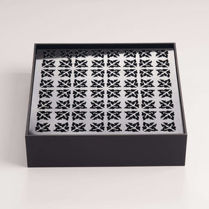 Minimalist black acrylic tea tray designed for practical daily tea brewing
