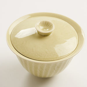 top view of yellow glaze ceramic gaiwan with lid and fluted knob