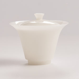 White jade like gaiwan with lid on a light gray background