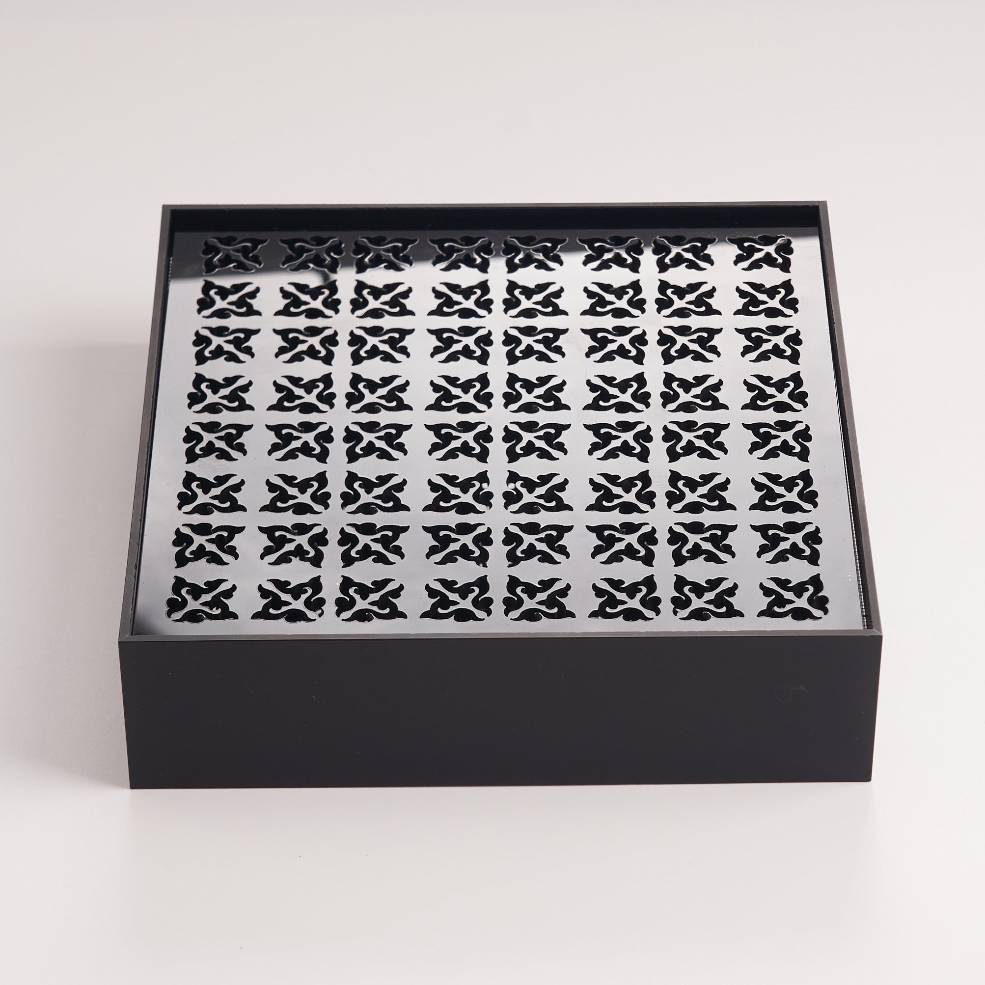 Minimalist black acrylic tea tray designed for practical daily tea brewing