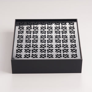 Minimalist black acrylic tea tray designed for practical daily tea brewing