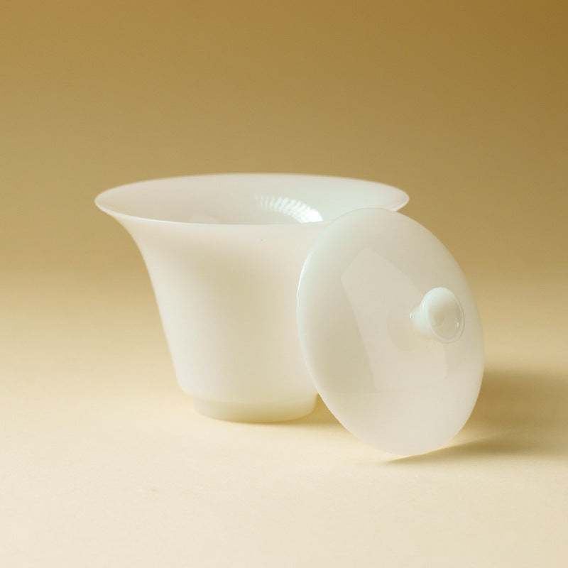 Jade like gaiwan on a beige background