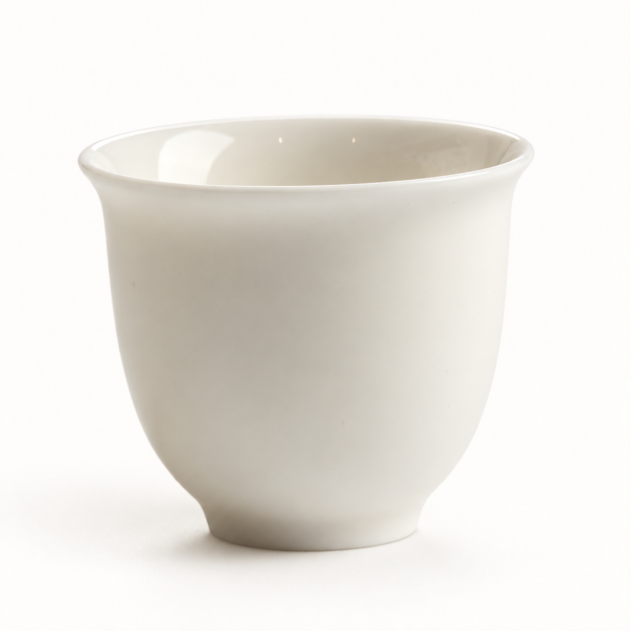 Bloom White Porcelain Tea Cup — studio view