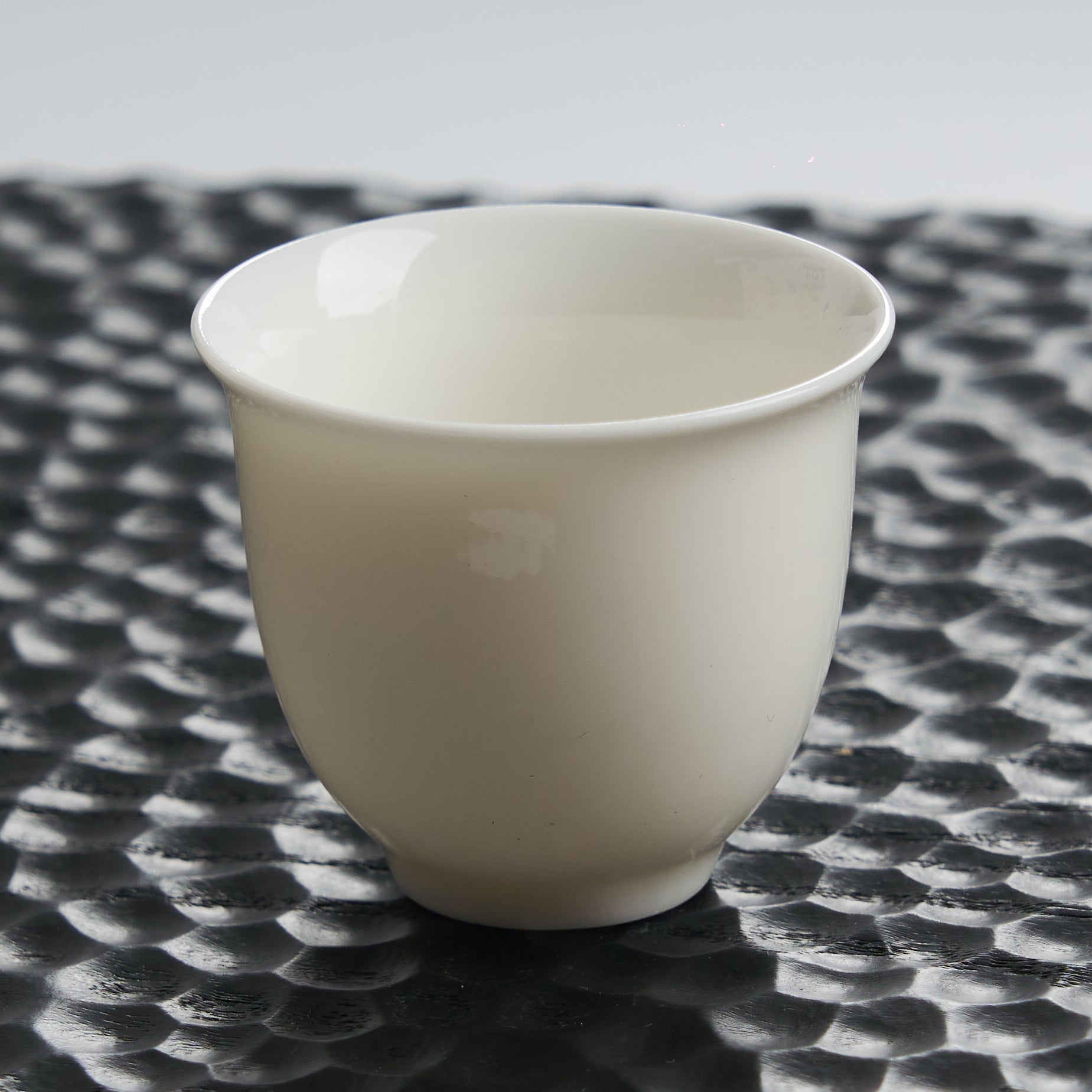 Bloom White Porcelain Tea Cup — styled tea setting