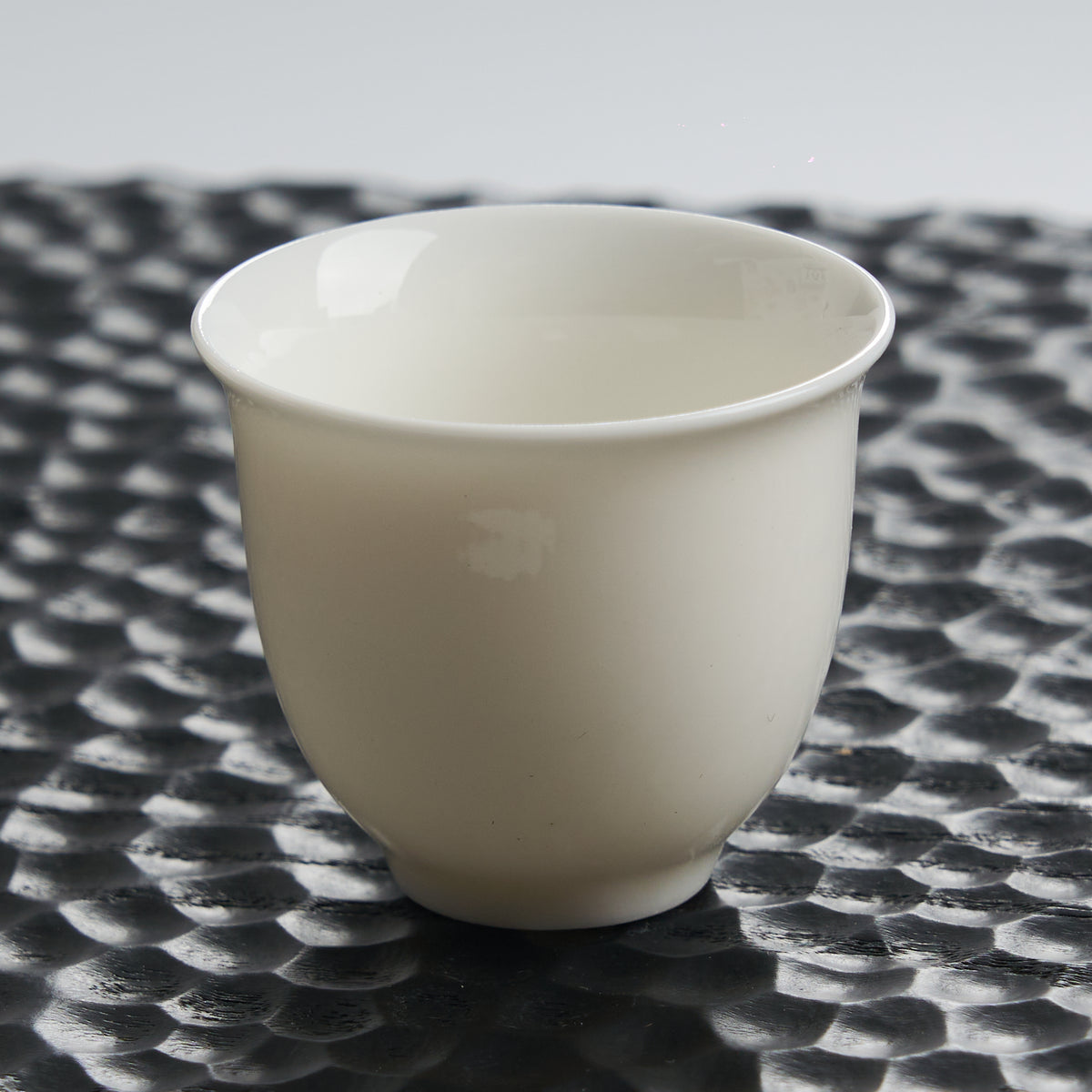 Bloom White Porcelain Tea Cup — styled tea setting