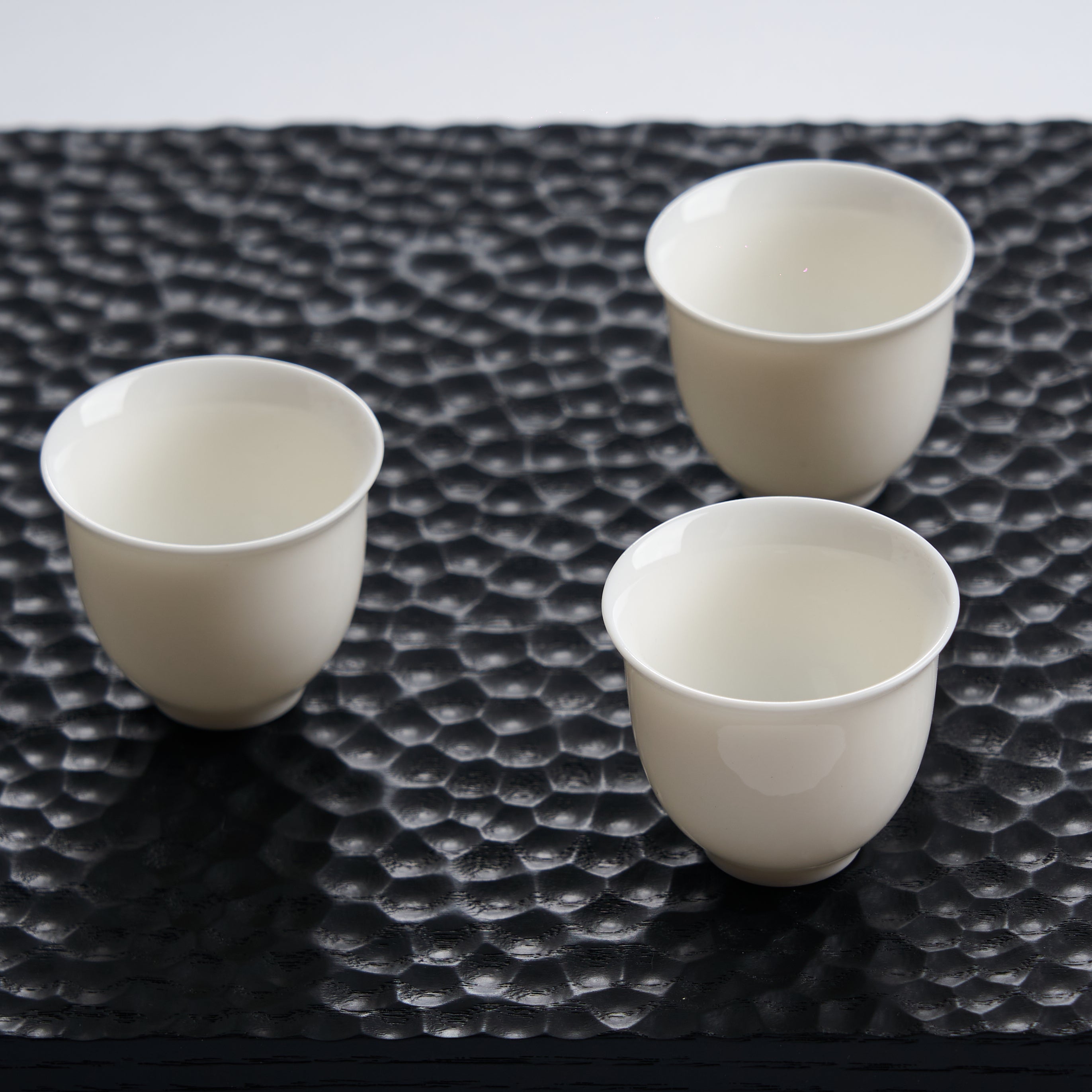 Bloom White Porcelain Tea Cup — styled tea setting