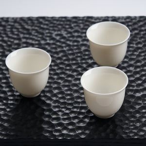 Bloom White Porcelain Tea Cup — styled tea setting