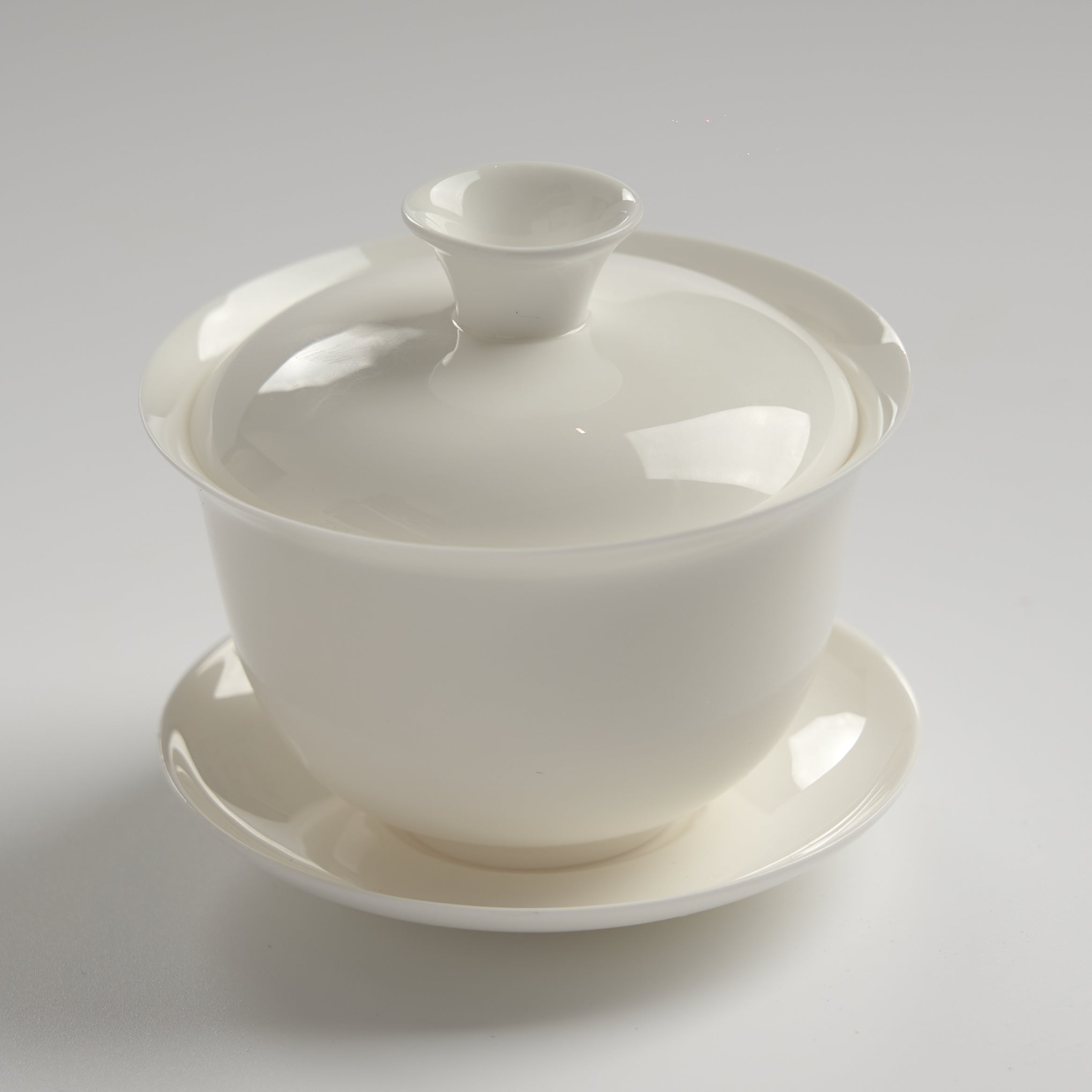 Translucent bone china 3-inch gaiwan, slightly overhead view