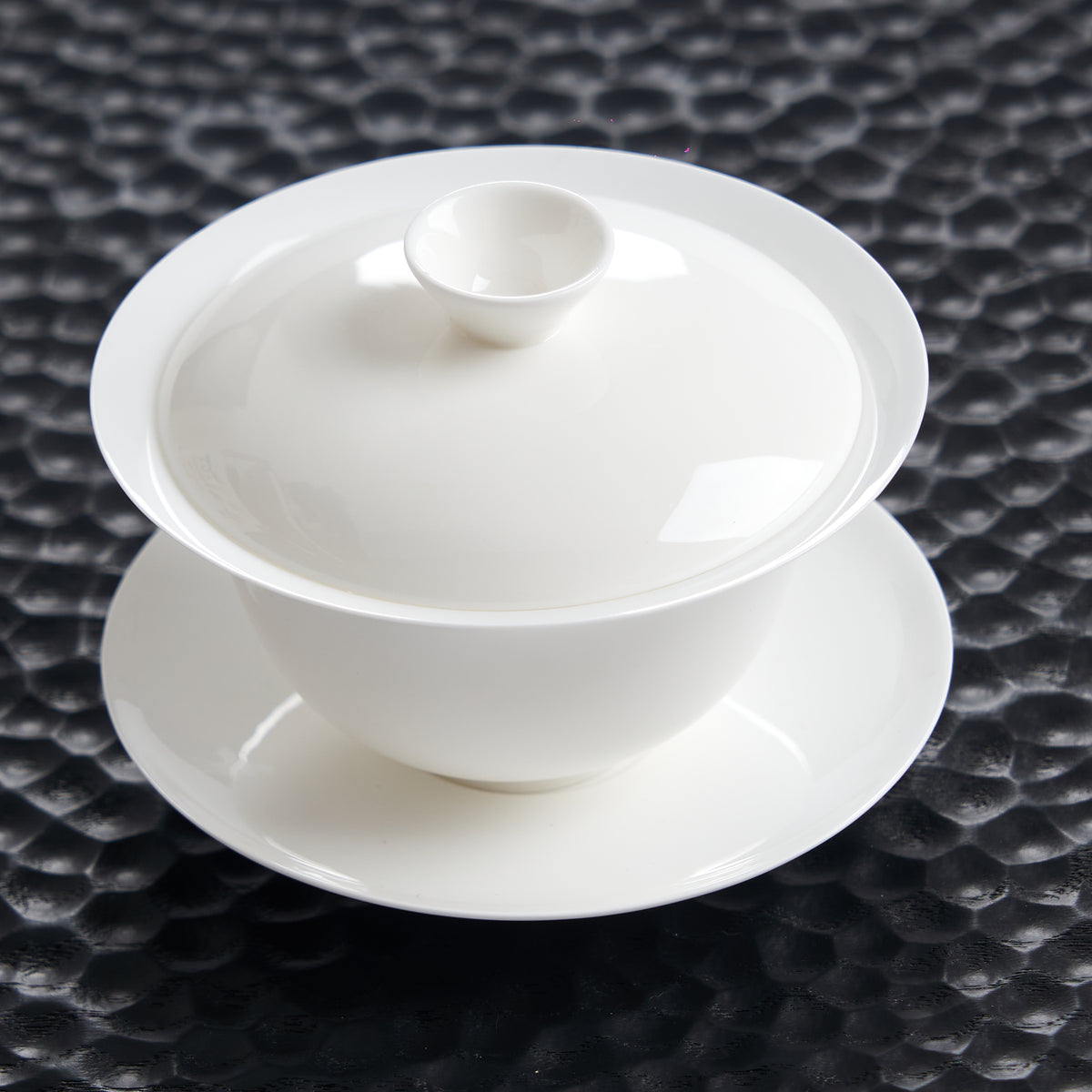 150 ml white bone china gaiwan with saucer on a dark textured tea tray
