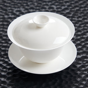 150 ml white bone china gaiwan with saucer on a dark textured tea tray