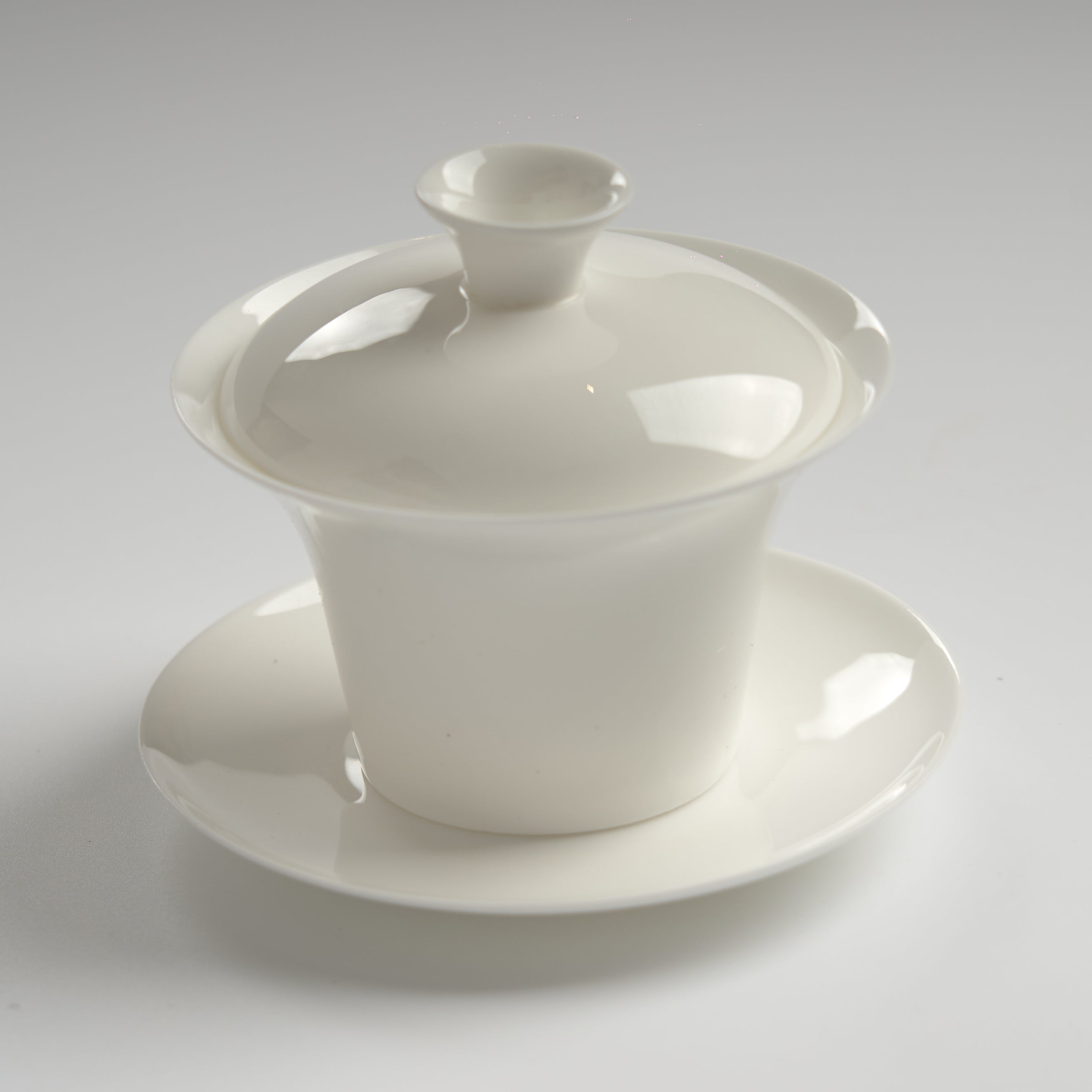 Translucent bone china trumpet-rim gaiwan, slightly overhead view