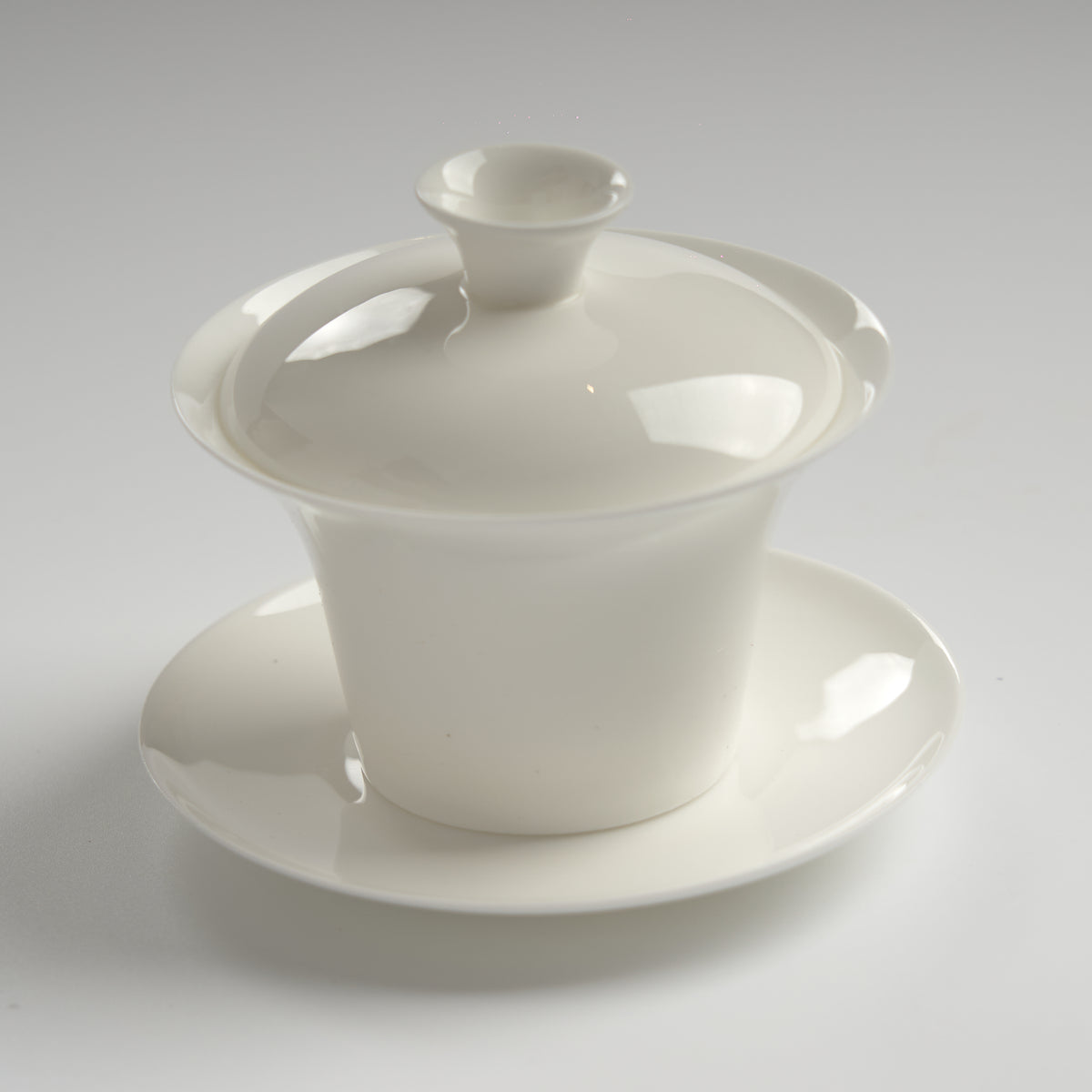 Translucent bone china trumpet-rim gaiwan, slightly overhead view