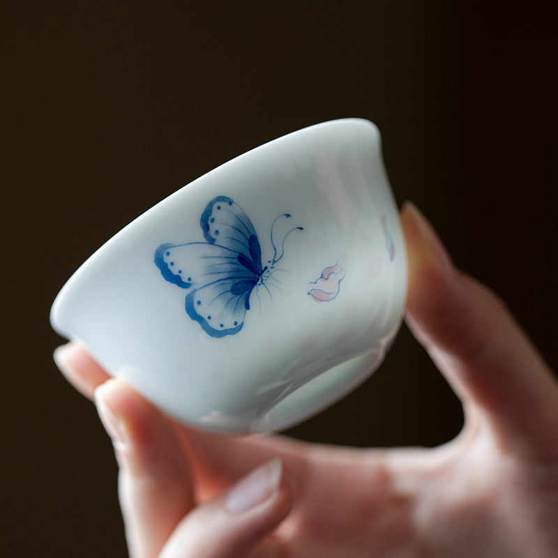 Butterfly and Flower Hand-Painted Tasting Cup in a tea setting
