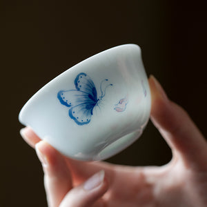 Butterfly and Flower Hand-Painted Tasting Cup in a tea setting