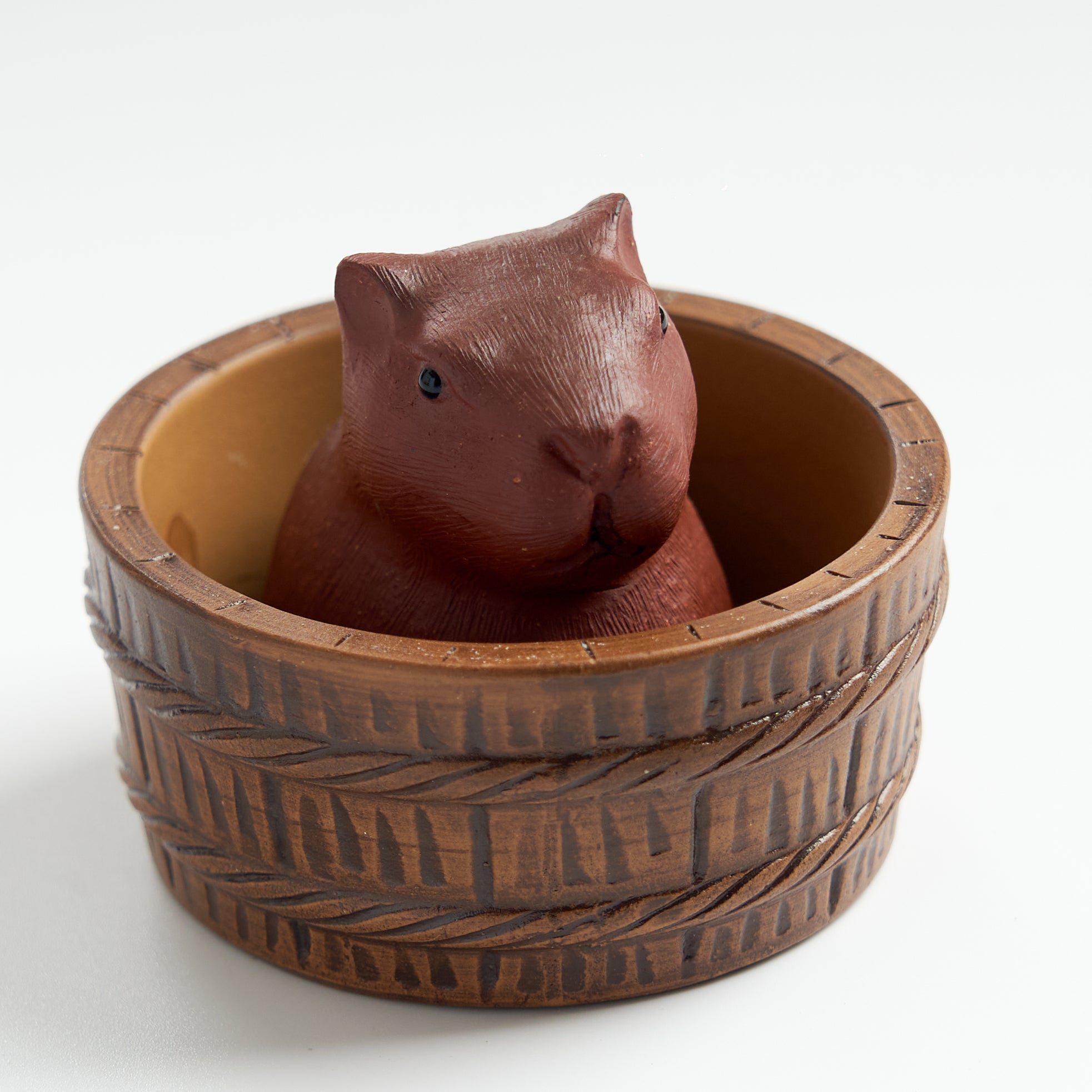 Handmade capybara water-tray tea pet set, slightly overhead view