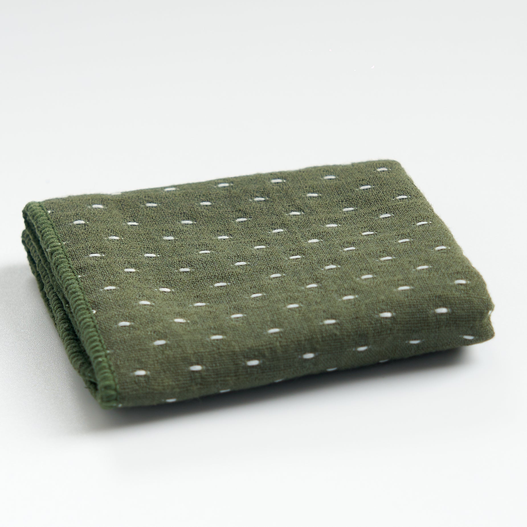 Thick cotton-linen tea towel in green, folded product view