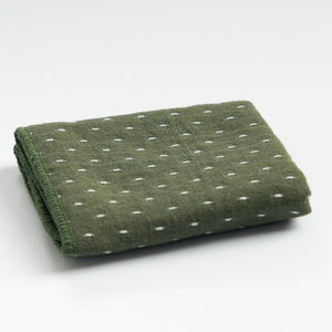 Thick cotton-linen tea towel in green, folded product view