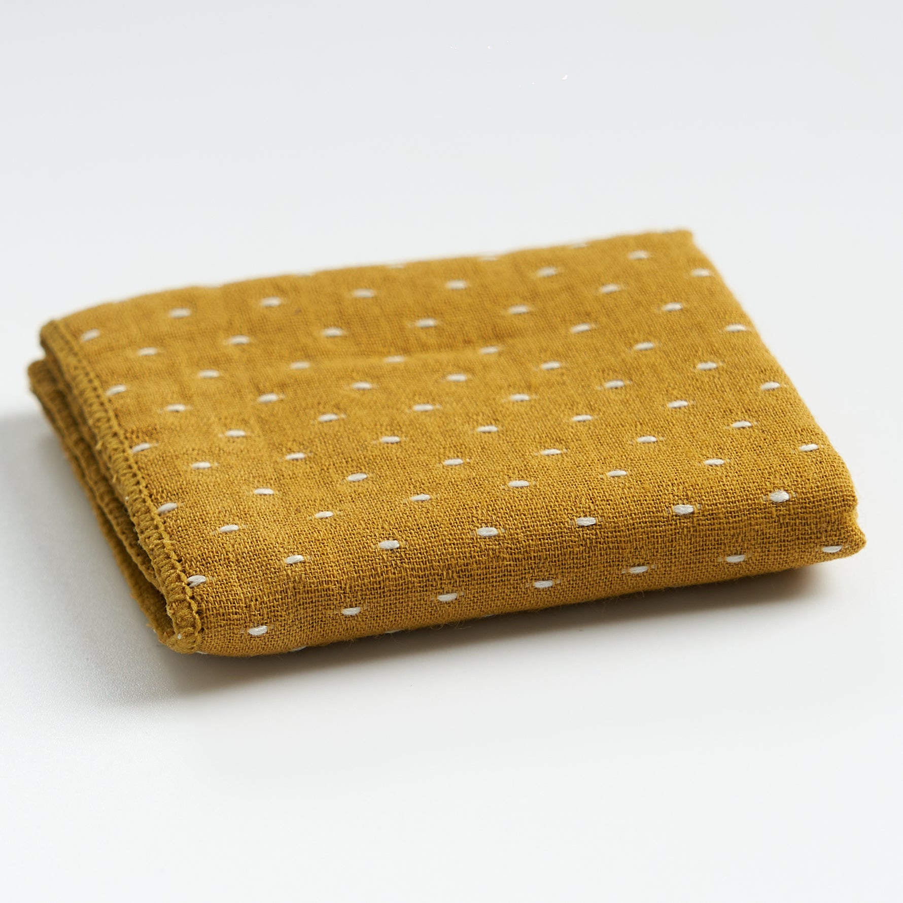 Thick cotton-linen tea towel in yellow, folded product view