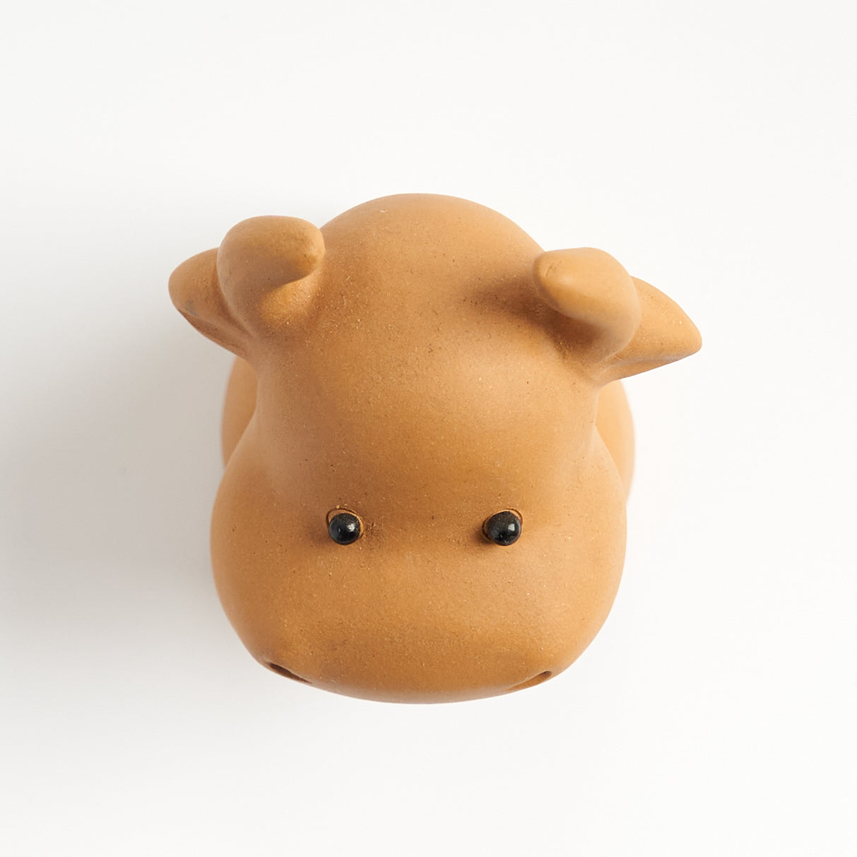 Cute sculpted ox tea pet, top-down view