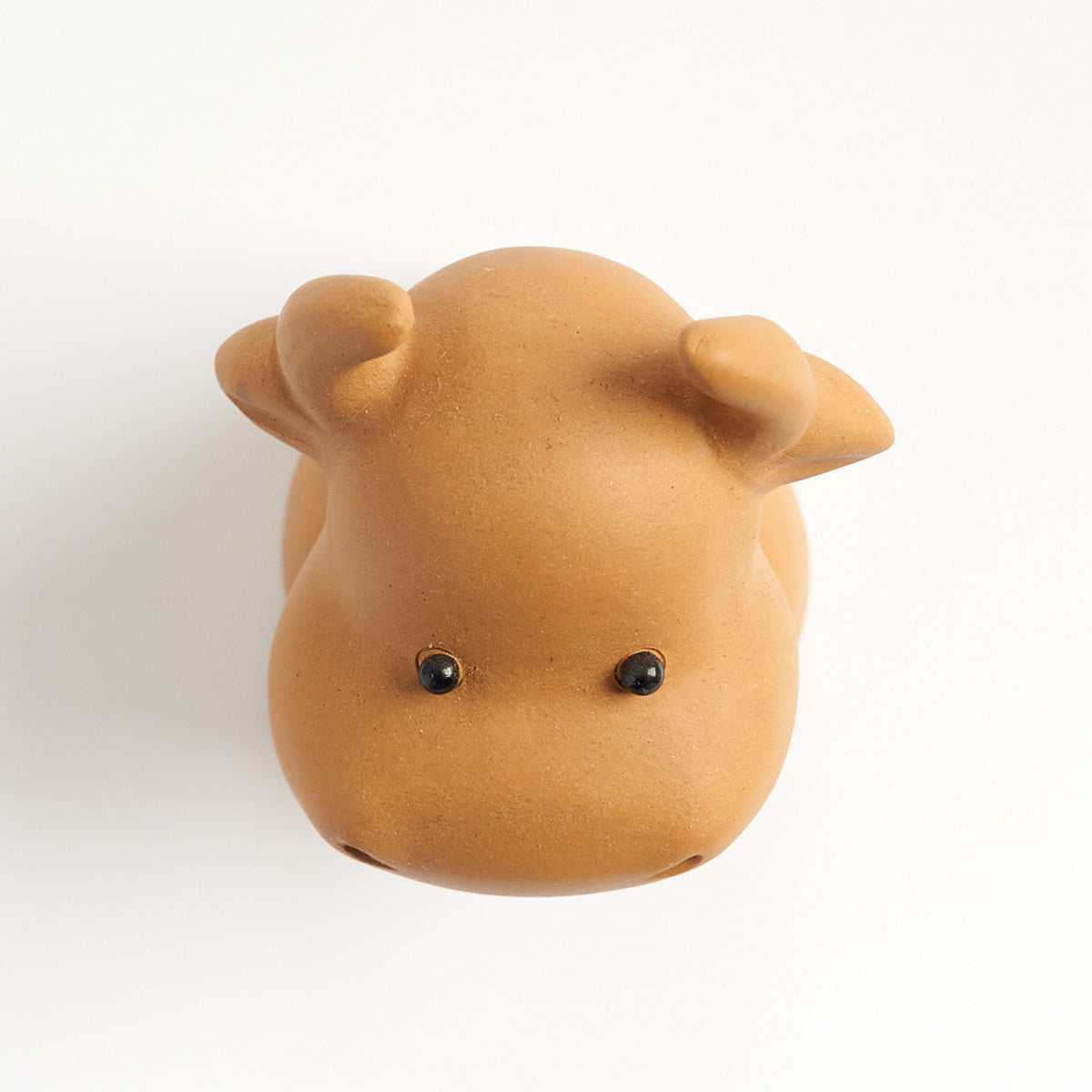Cute sculpted ox tea pet, top-down view