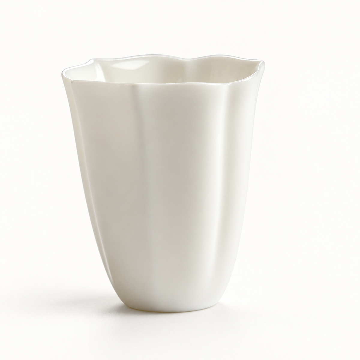 Faceted White Porcelain Tea Cup — studio view