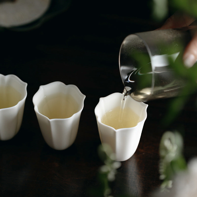 Faceted White Porcelain Tea Cup — supplier styled photo