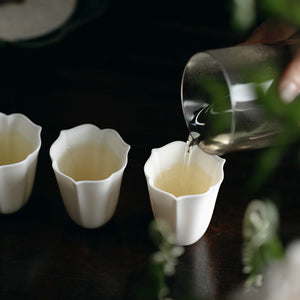 Faceted White Porcelain Tea Cup — supplier styled photo
