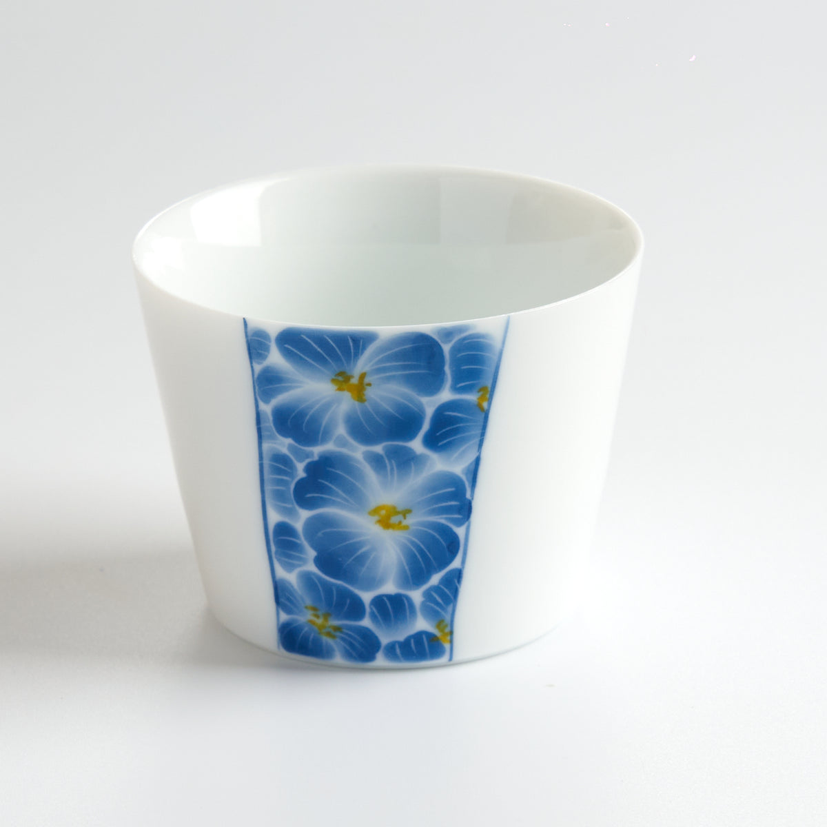 Blue-and-White Hand-Painted Floral Heart Master Cup — angled view