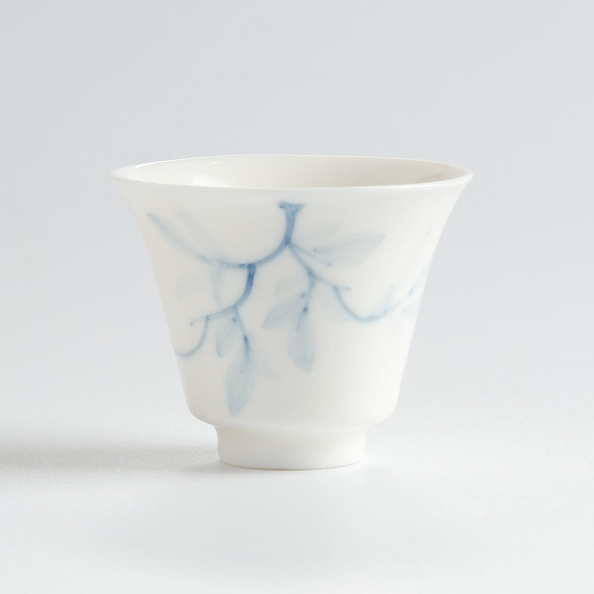 Blue-and-White Porcelain Hand-Painted Magnolia Tasting Cup — front view