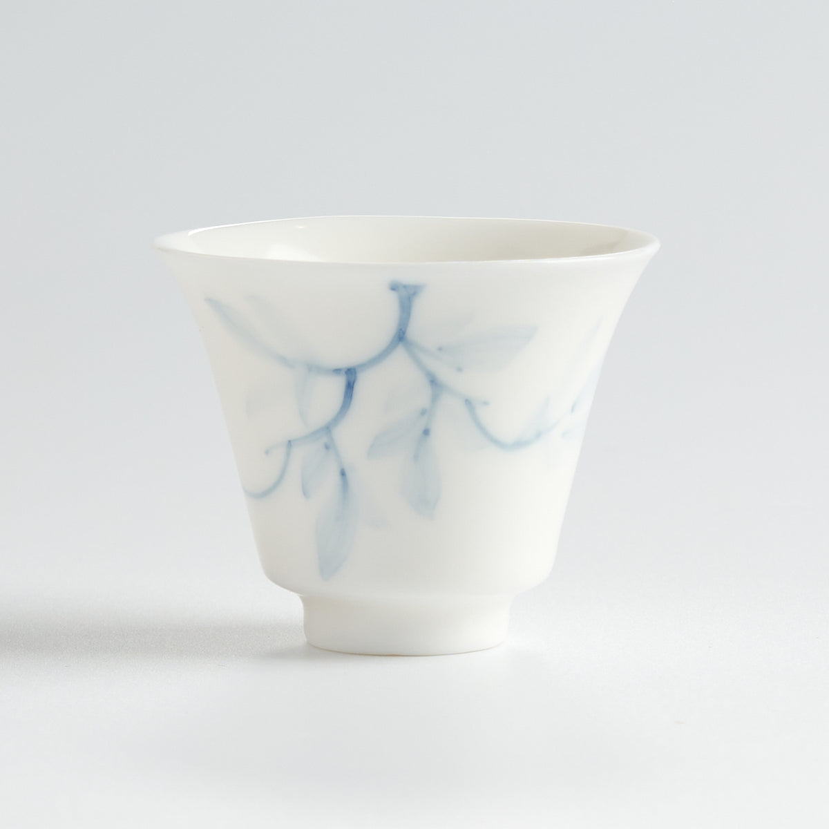 Blue-and-White Porcelain Hand-Painted Magnolia Tasting Cup — front view