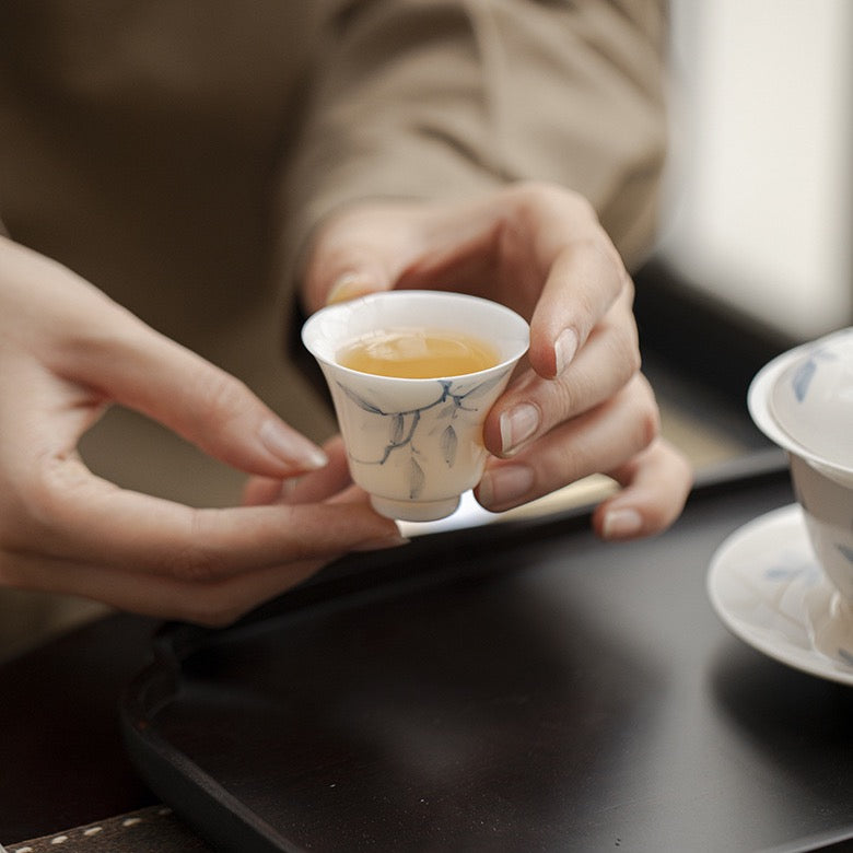 Blue-and-White Porcelain Hand-Painted Magnolia Tasting Cup in a tea setting