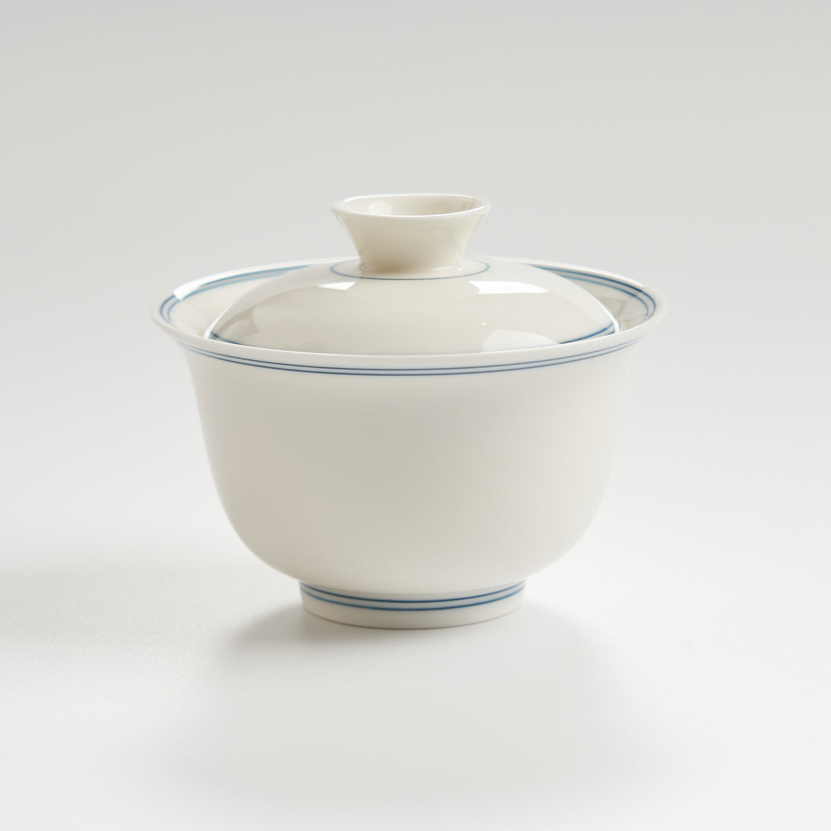 Sheep-fat white porcelain blue-rim evaluation gaiwan, alternate front view