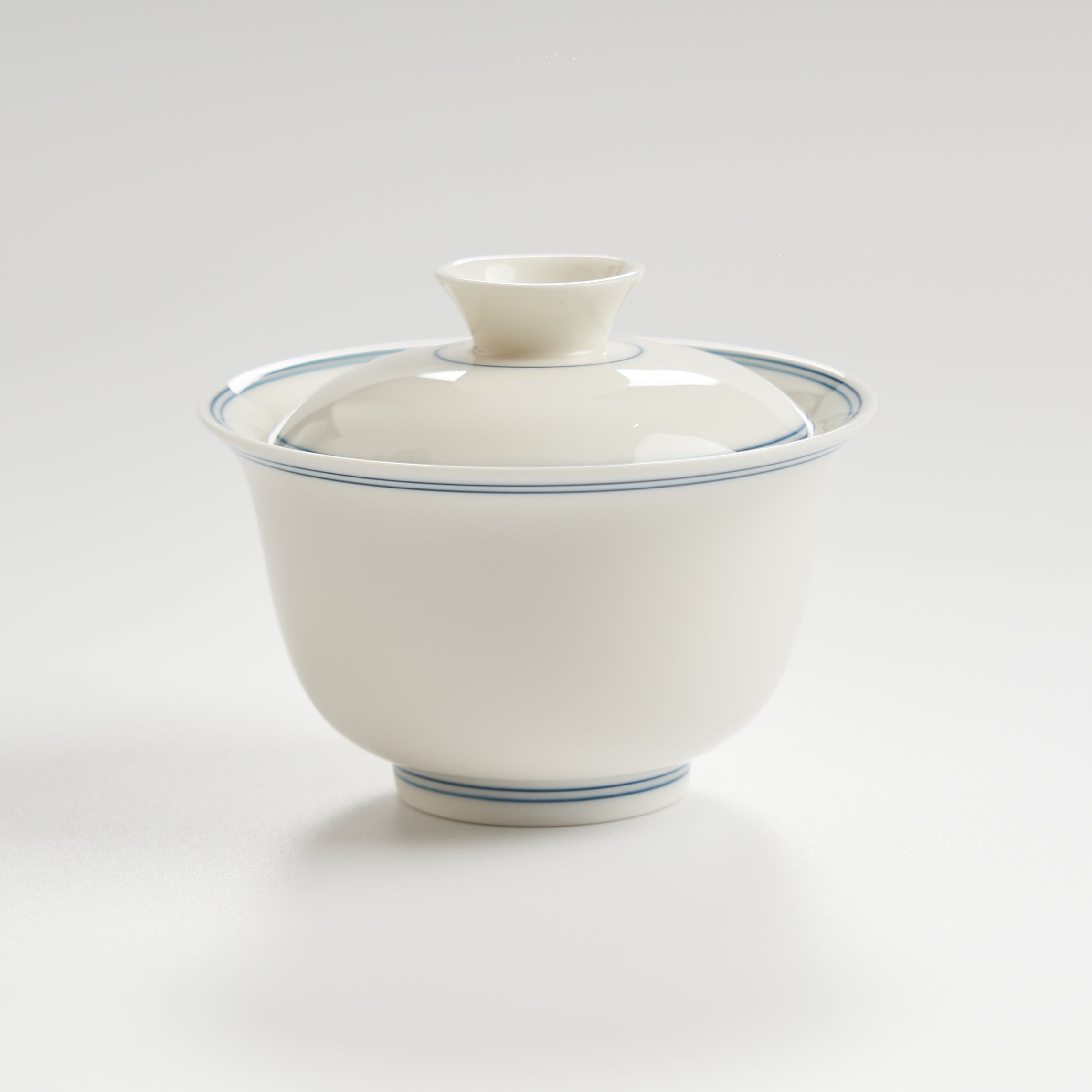 Sheep-fat white porcelain blue-rim evaluation gaiwan, front view in a second size