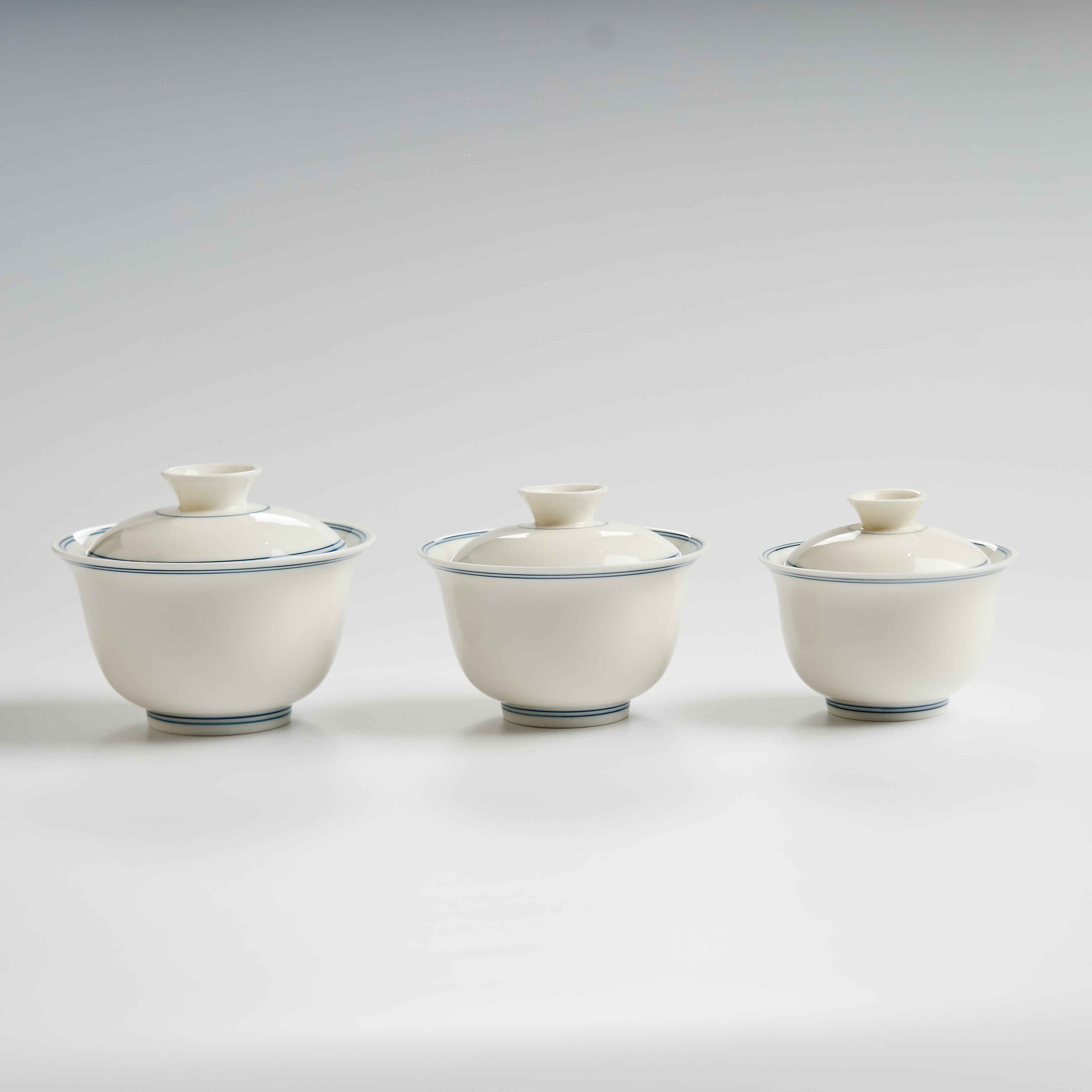 Sheep-fat white porcelain blue-rim evaluation gaiwan, three-size lineup
