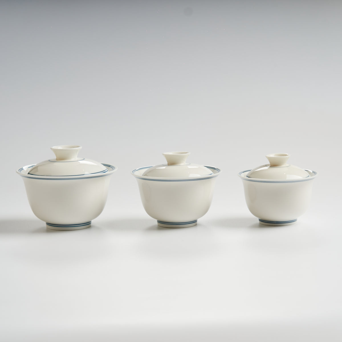 Sheep-fat white porcelain blue-rim evaluation gaiwan, three-size lineup