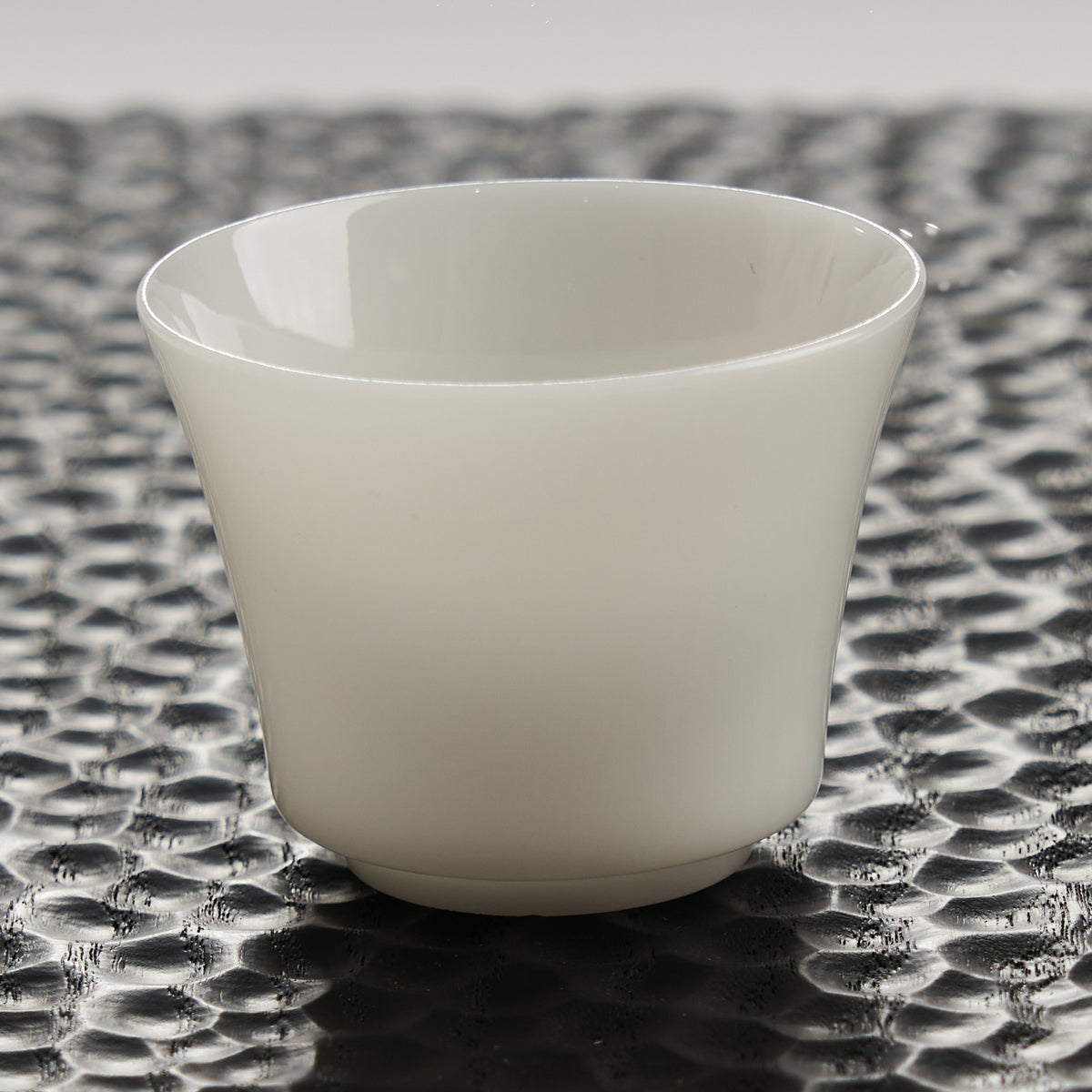 Translucent White Porcelain Tea Cup — styled tea setting