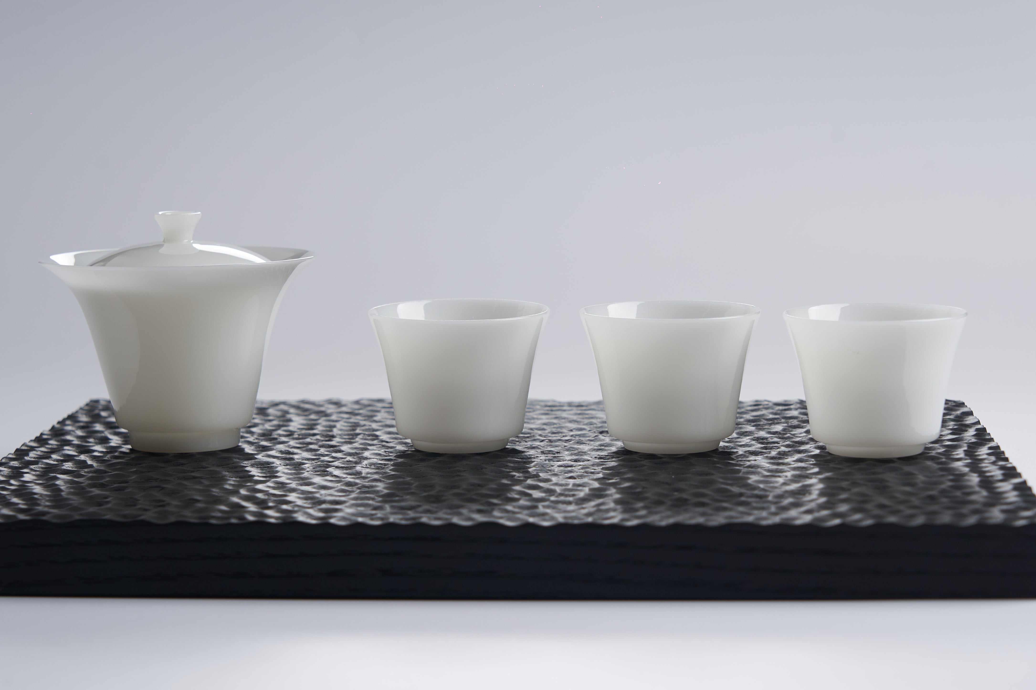 Translucent White Porcelain Tea Cup — styled tea setting