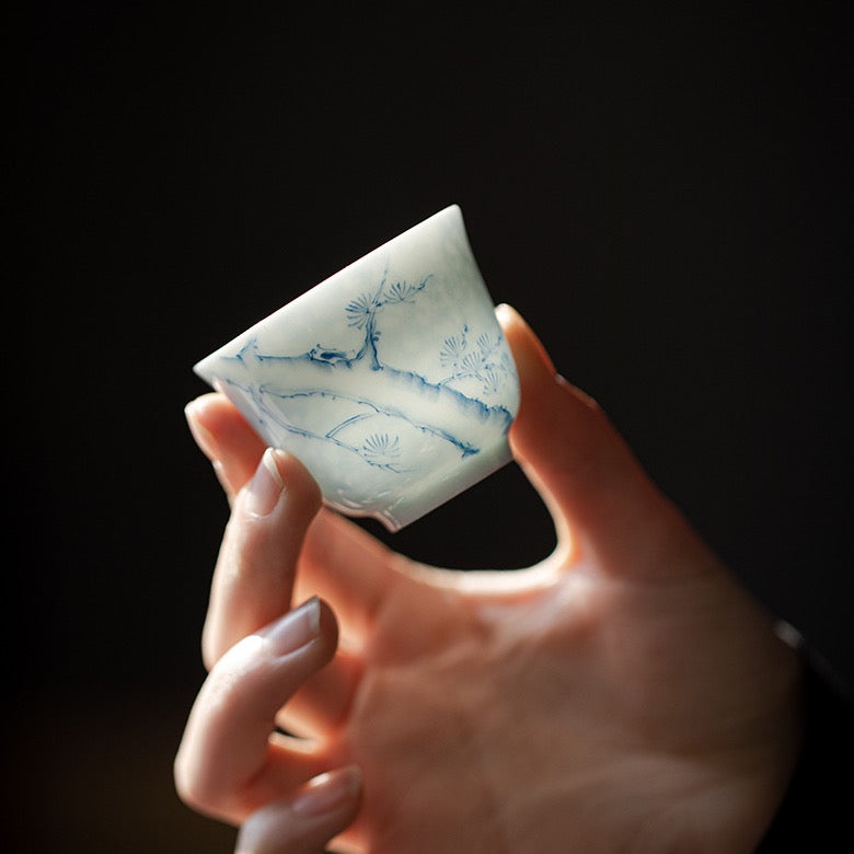 Underglaze Blue-and-White Hand-Painted Pine Cup lifestyle view