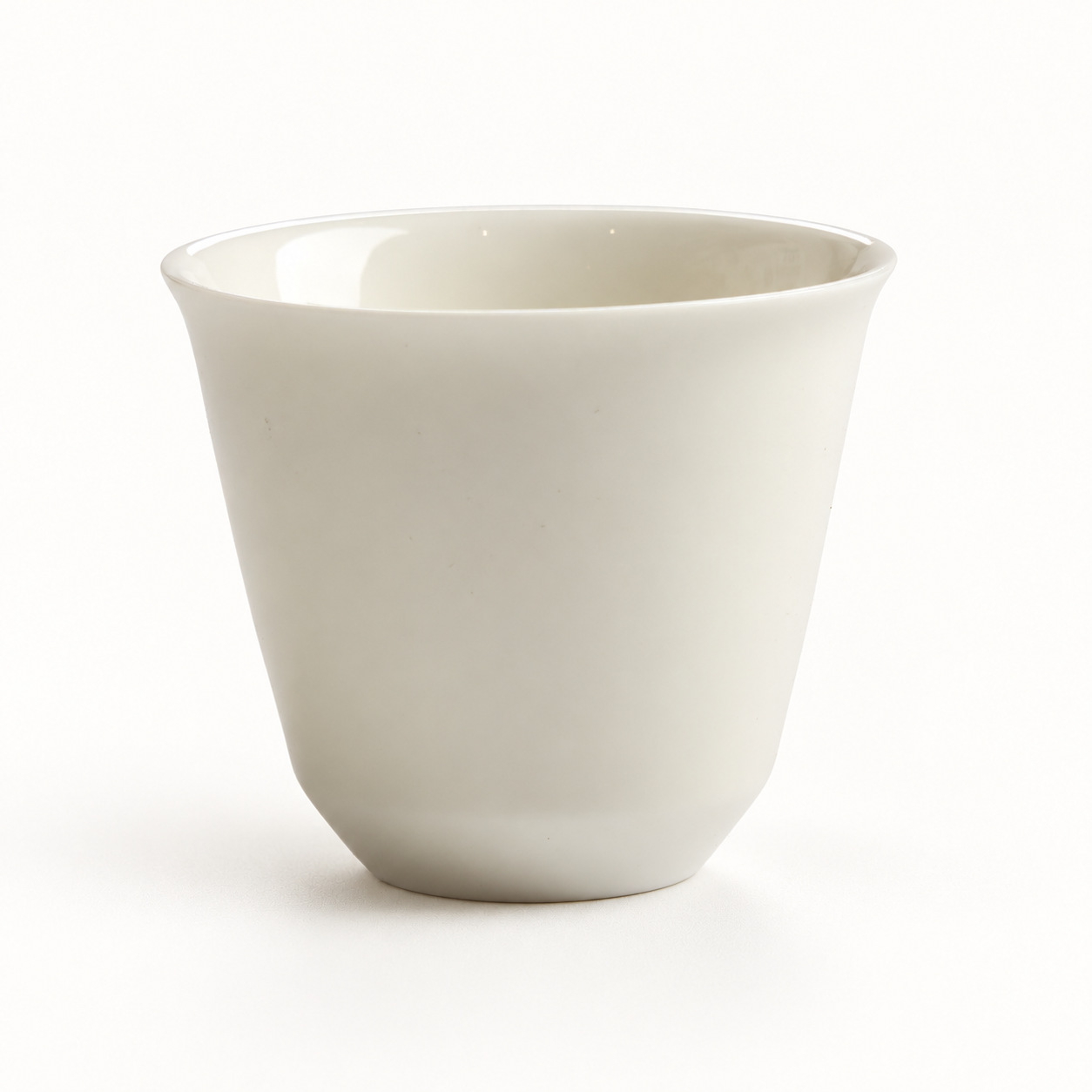 Wangshu Ivory Porcelain Tea Cup — studio view